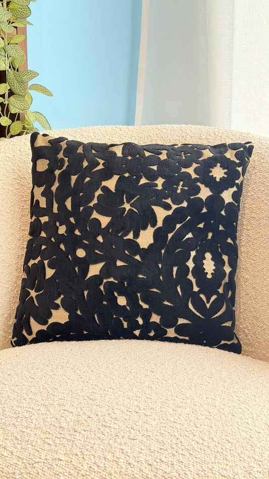 Coussin noir et doré