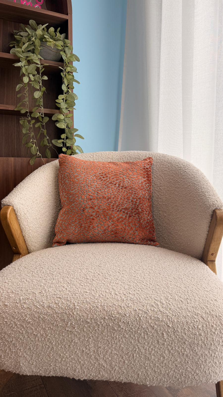 Coussin orange léopard